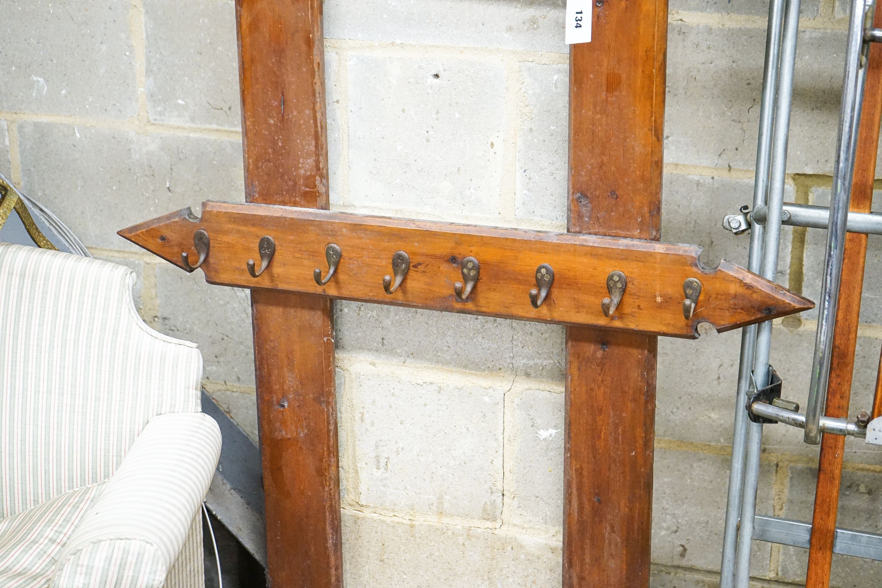 A late Victorian pitch pine hall stand, width 96cm, height 212cm